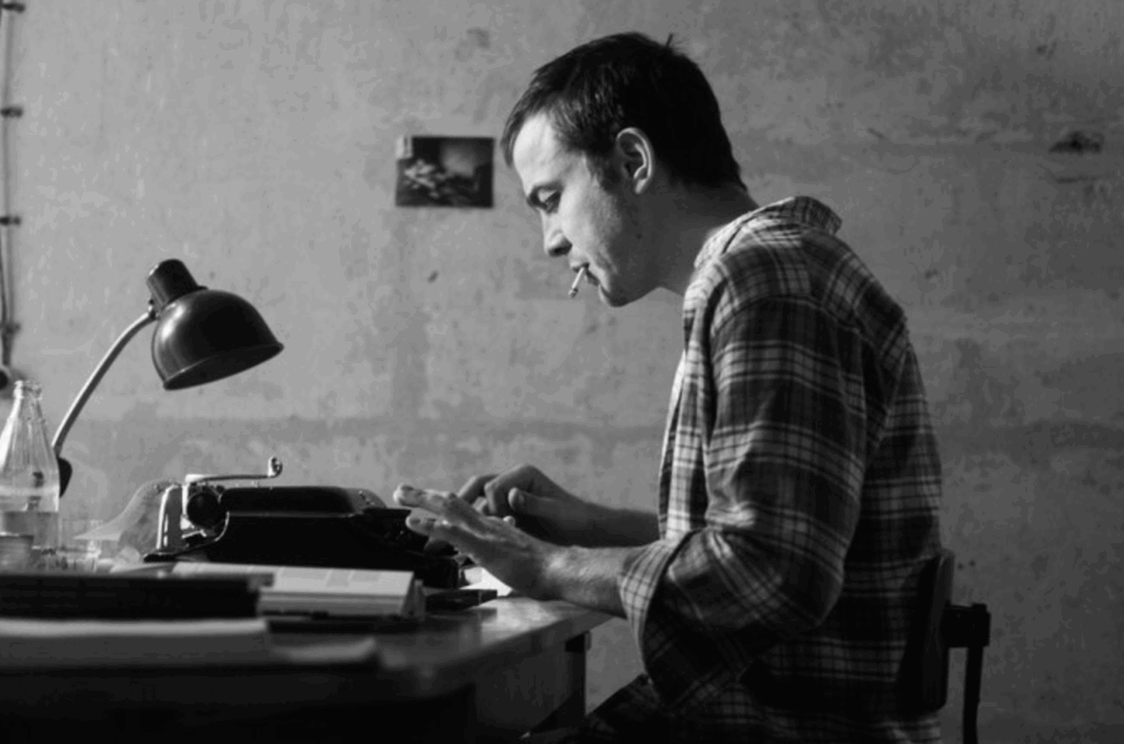 Thomas writing on his writing machine