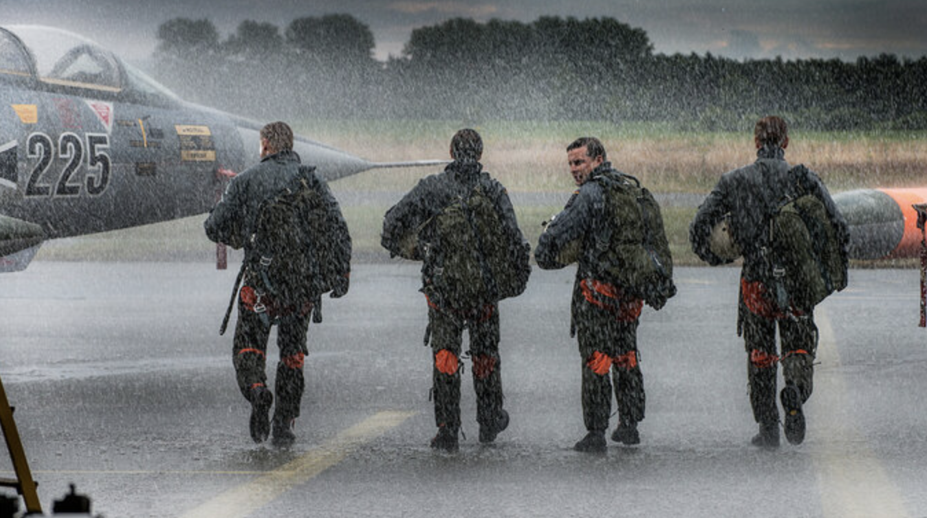 pilots on their way to a starfighter