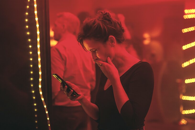 ELENA witnessing the online backlash for her book better-world on her phone